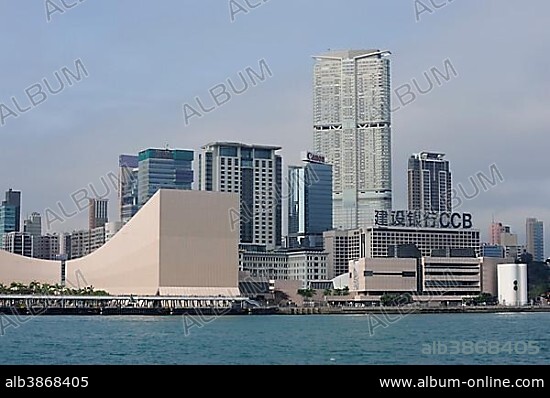 Hong Kong Museum of Art in the Cultural Centre Complex and The Masterpiece, a skyscraper accommodating the Hyatt Regency Hotel, Tsim Sha Tsui, Kowloon, Victoria Harbour, Hong Kong, China, Asia.