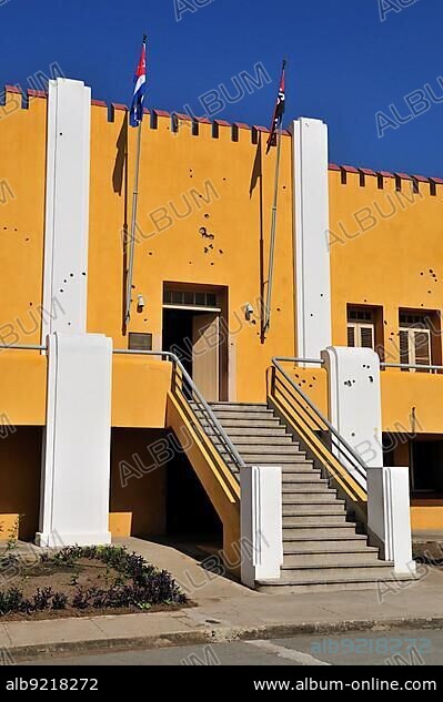 Facade of the Moncada Barracks with bullet holes, now school centre and historical museum; the fight of revolutionaries around Fidel Castro against the Batista regime commenced here on 26 July 1953, Santiago de Cuba, Cuba, Caribbean, Central America.