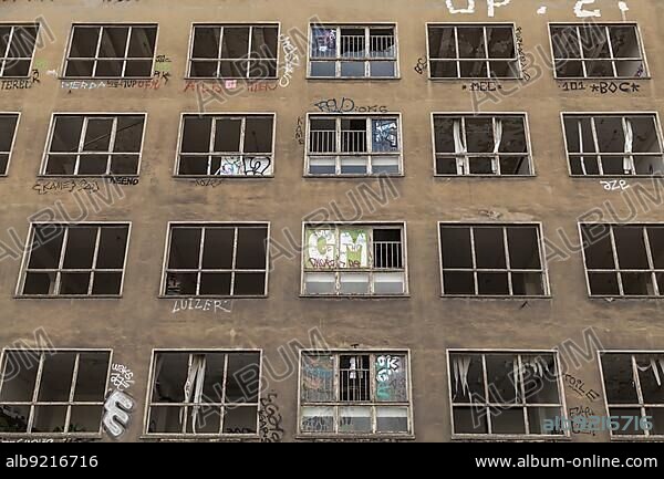 Building facade with broken windows, Berlin, Germany, Europe.