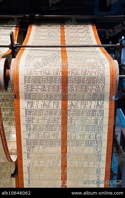 Teleprinter, fax machine, punched paper, punched code, data transmission, analogue, history, office, office history, punched tape, paper, translation.