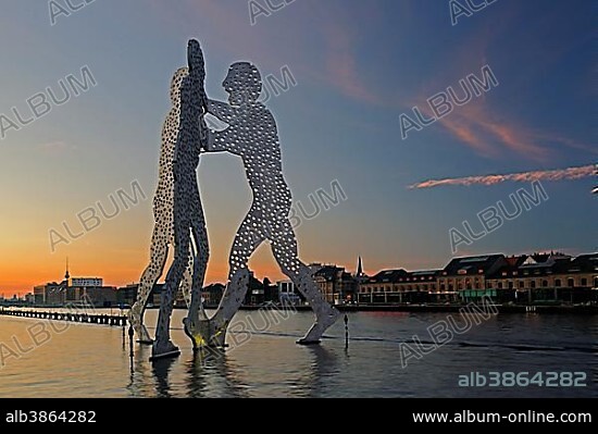 Molecule Men, 30 metre high work of art made of aluminum, sculptor Jonathan Borofsky, standing in the Spree River at sunset, Berlin, Germany, Europe, PublicGround, Europe.