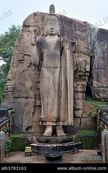Standing Buddha in Aukana, gesture of fearlessness and encouragement, but also a blessing gesture, Sri Lanka, Ceylon, Asia.