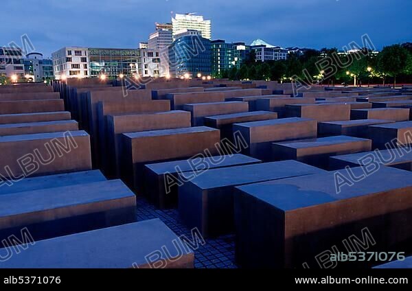 Holocaust Memorial designed by architect Peter Eisenman, memorial to the murdered jews of Europe, with a view of the skyline of the Potsdamer Platz square, Tiergarten district, Mitte district, Berlin, Germany, Europe.