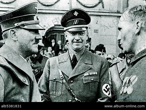 Adolf Hitler and Konrad Henlein, Reichsstatthalter imperial lieutenant and Gauleiter regional branche leader, historical photo circa 1937.