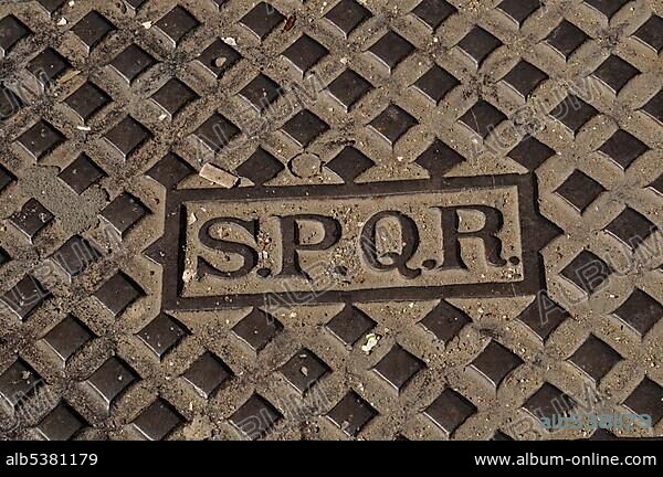 S.P.Q.R. inscription on a manhole cover, Rome, Lazio, Italy, Europe.