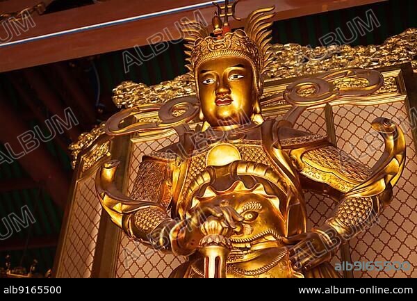 Skanda bodhisattva statue in Tian Wang Dian (Hall of Celestial king) . Lian Shan Shuang Lin Monastery, Singapore, Asia.