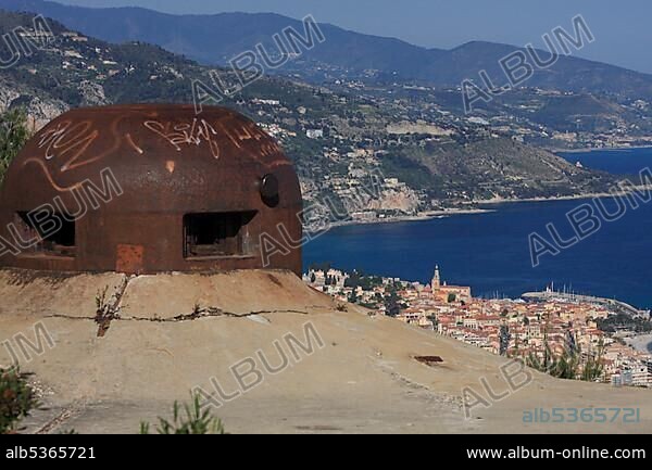 Gun turret of a fort of the Maginot Line in Roquebrune Cap Martin, Menton at back, DÃ©partement Alpes Maritimes, RÃ©gion Provence Alpes CÃ´te d'Azur, France, Europe.