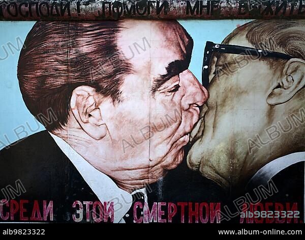 Dmitri Vrubel; Socialist Brotherly Kiss between Leonid Breshnev and Erich Honecker; artwork on the former Berlin Wall; graffiti; East Side Gallery; Berlin; Germany; Europe.