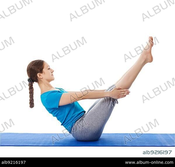 Yoga, young beautiful woman yoga instructor doing Full Boat pose asana (Paripurna navasana) exercise isolated on white background.