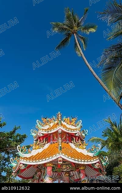 Buddhist temple at Maenam Beach, beach, religion, temple complex, Buddhism, sacred, religious, world religion, offering, pilgrimage site, pray prayer, Asian, Buddha, colourful, tourism, travel, culture, history, world religion, palm tree, outside, building, faith, palm tree, Koh Samui, Thailand, Asia.