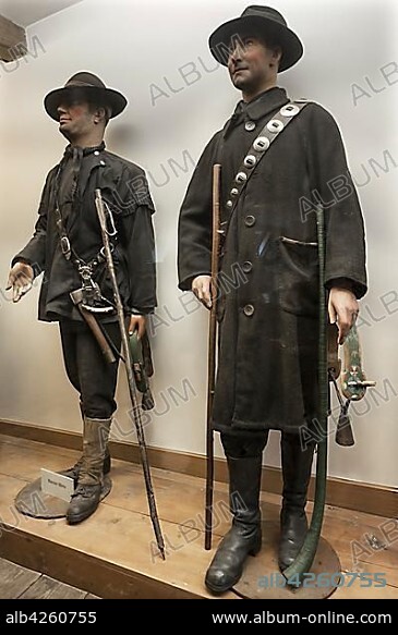 Figures of shepherds from Thuringia in the foreground and from the Harz Mountains behind in a showcase, Deutsches Hirtenmuseum or German Shepherds Museum, Hersbruck, Middle Franconia, Bavaria, Germany, Europe.