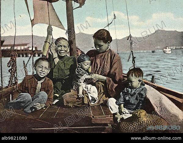 The Life of a Family on a Sampan Boat; flat; wide rowing or sailing boat also used as a houseboat in East Asia; c. 1904; China; Historic; digitally restored reproduction from a 19th century original; Asia.