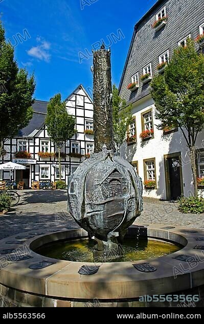 History fountain, in front of restaurant 'Ratsschänke', Old Town, Brilon, North Rhine-Westphalia, Germany, Europe.