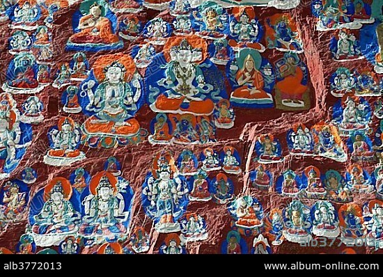 Tibetan Buddhism, colorful rock paintings, plenty of images of Buddha and monks, sacred path of Lingkhor, historic district, Lhasa, Himalaya Range, central Tibet, Ue-Tsang, Tibet Autonomous Region, People's Republic of China, Asia.
