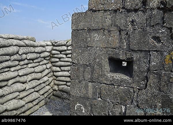 Bullet holes and loophole at the Dodengang, Boyau de la Mort, Trench of Death, First World War One trenches along the river Yser, Diksmuide, Belgium, Europe.