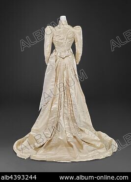 Evening dress in pale pink satin and cream satin brocade with applied maple leaves top