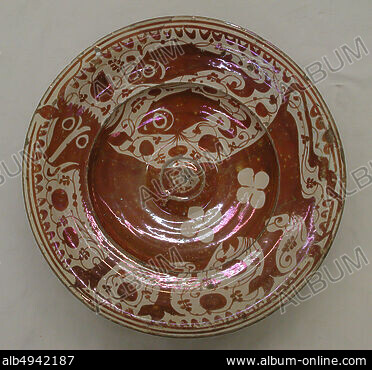 A 19th Century Hispano - Moresque Yellow Charger with Faint Lustre Glaze A 19th Century Hispano - Moresque Yellow Charger with Faint Lustre Glaze