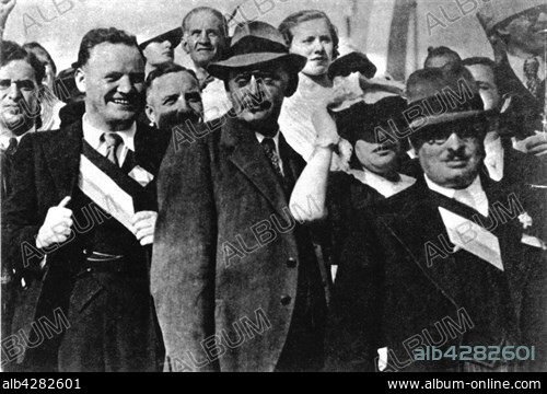 Maurice Thorez, A. Bayet and Jacques Duclos. France. July 14, 1935.