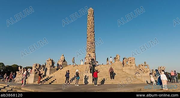 Visitors between granite sculptures, terrace at granite human monolith by Gustav Vigeland, Vigeland Sculpture Park, Frognerparken, Frogner, Oslo, Norway, Europe.