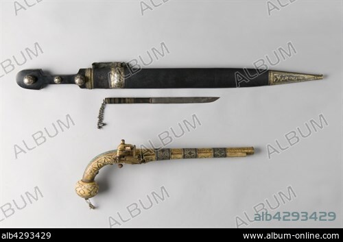 - Caucasian dagger. Circa 1850. - Caucasian flintlock pistol. 19th Century. Private collection. - Dagger: . Handle in horn, with three stud buttons in niellé silver. Wooden sheath covered with shagreen, with three trimmings in niellé silver. Small knife with horn handle. - Pistol :. Round cannon decorated with golden leaves patterns. Ornaments in niellé silver, engraved. Ball butt in walrus ivory with golden decorations.