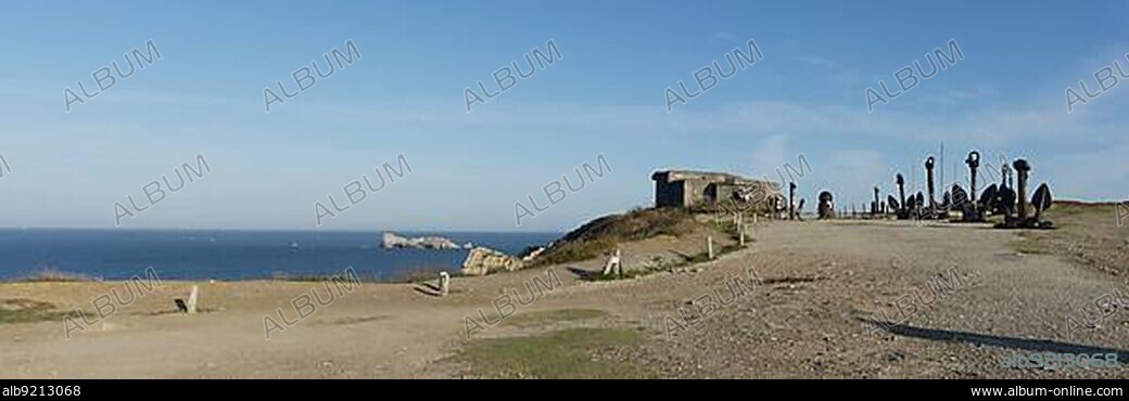 France - 23 August, 2019: bunker and battleship anchor memorial of WWII Atlantic Battle at the Pointe de Penhir in Brittany.