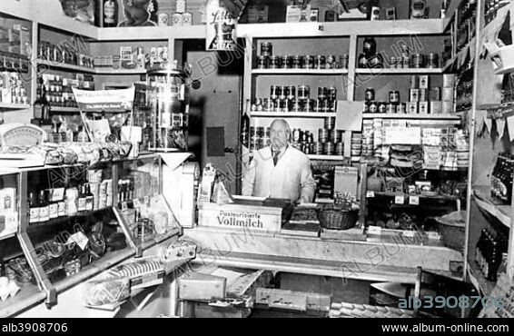 Aunt Emma shop with salesman, 1950s, Germany, Europe.