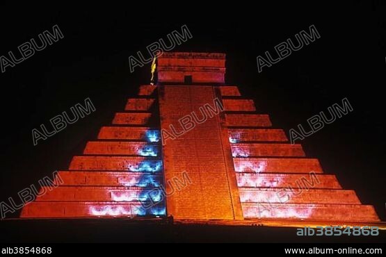 Pyramid of Kukulkan, illuminated red at night, Mayan ruins of Chichen Itza, Yucatan, Mexico, North America, Central America.