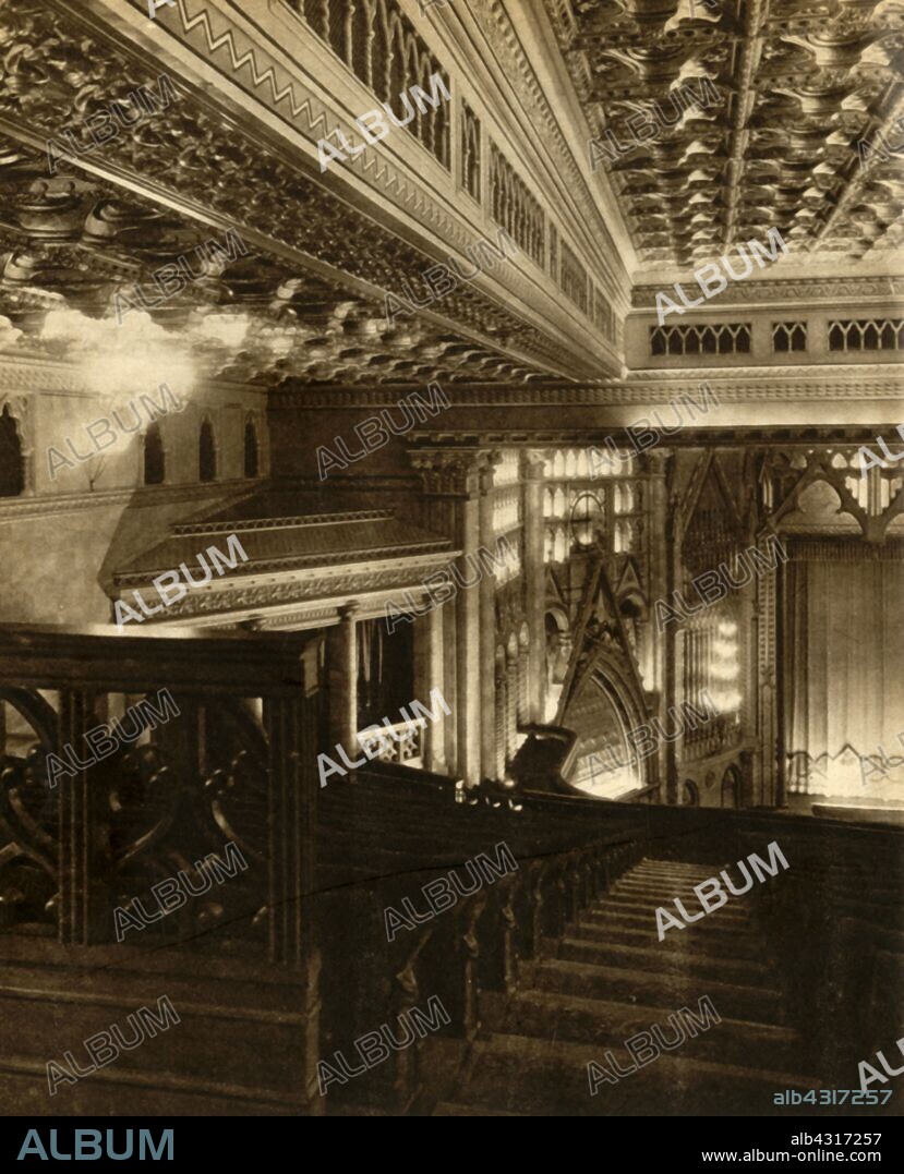 The Granada cinema, Tooting, London, 1931, (1933). The Granada, Tooting: 'modelled on the Spanish-Moorish architecture of the city from which it took its name.' Interior of the newly-opened cinema, built in luxurious Art Deco style, which was later granted Grade I Listed status. It is considered by many to be the most spectacular cinema in Britain. From "The Pageant of the Century". [Odhams Press Ltd, 1933].