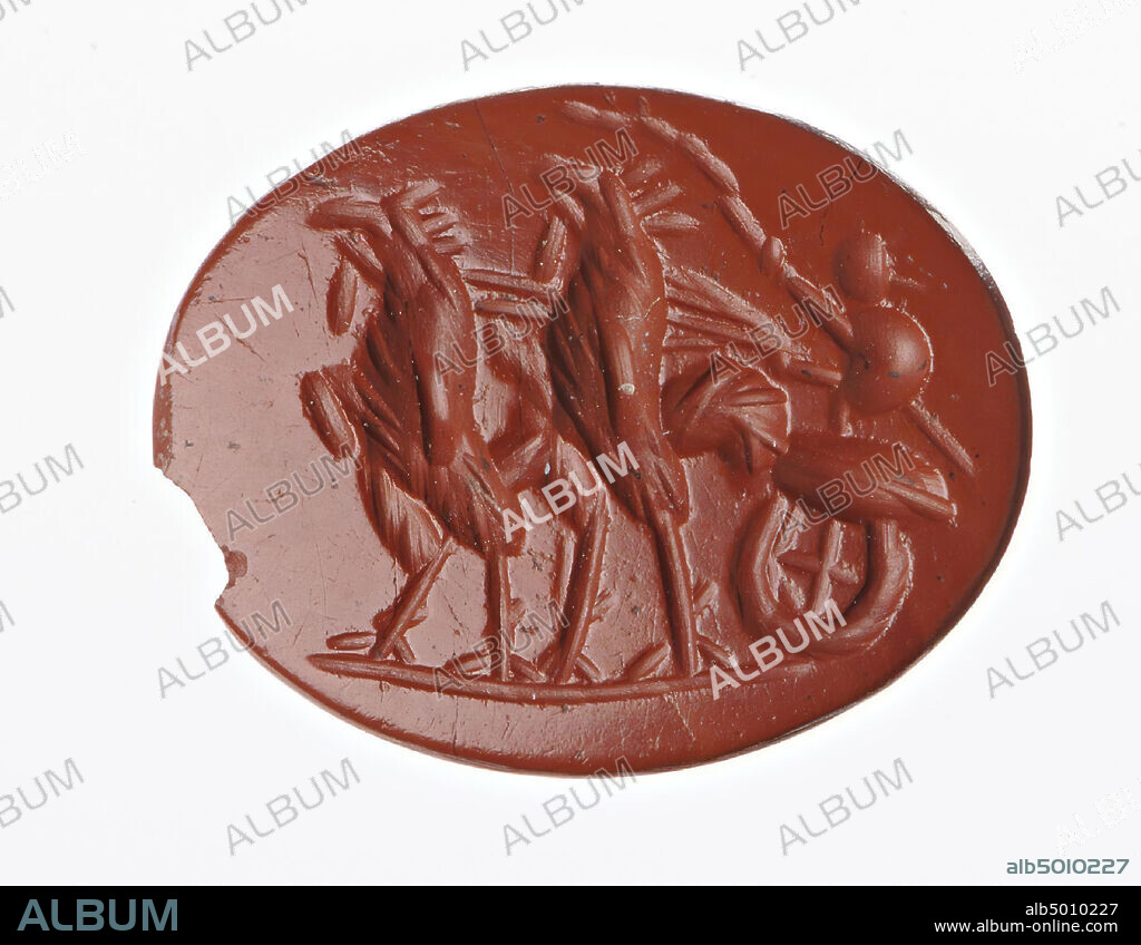 Vz: a small charioteer has a whip in his left hand and the reins for two big cocks in his other hand, the cocks stand for a small car., Gem, intaglio, ringstone, jasper, Color: red, Form : oval, Machined: edge cut at the front compared to the rear, Method: deep body modeling with very rounded drills, detailing with parallel and rounded wheel grooves., 14.5 x 10 mm, D. 2.5 mm, 1st - 2nd century AD. 1-200 AD.