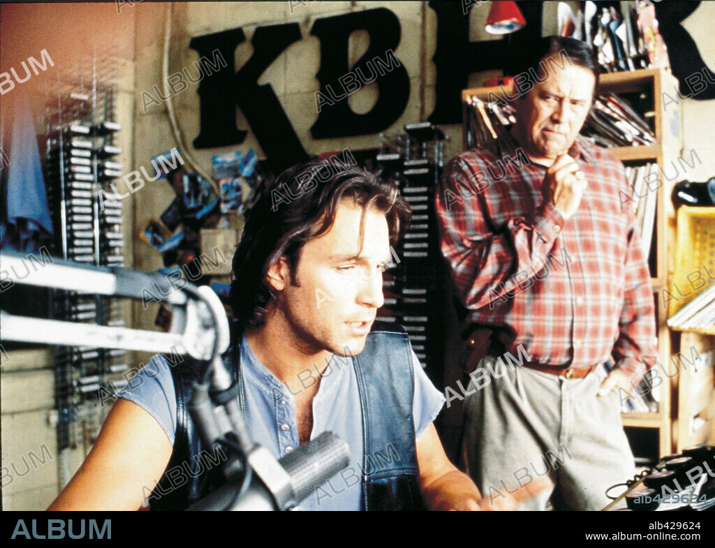 BARRY CORBIN and JOHN CORBETT in NORTHERN EXPOSURE, 1990. Copyright UNIVERSAL TV.