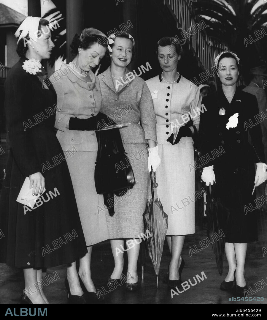 Mrs. Strath Playfair (second from left) and her daughters, Mesdames Keith Gollan, John Atwill, Alex Macleod and James Williams made a family group at Randwick With the exception of Mrs. Gollan, they all chose light-toned suits. October 02, 1955.