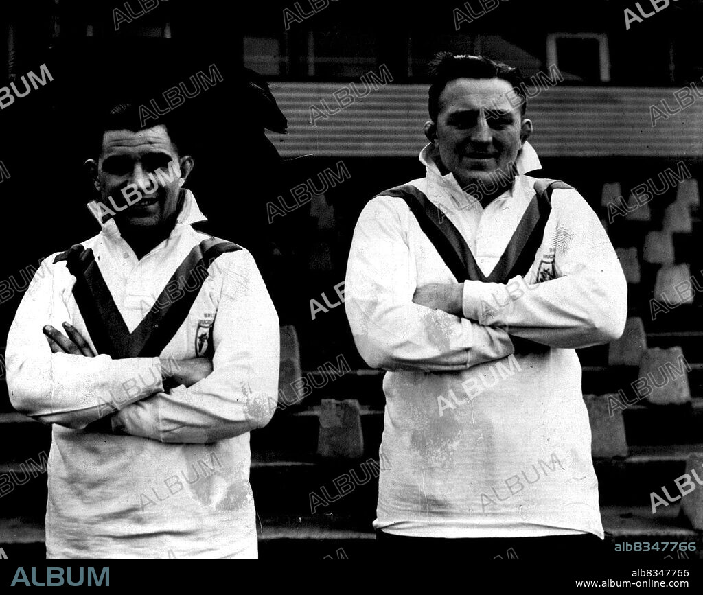 F. Higgins (Widnes), D. Naughton (Widnes).Weighty Problem -- Wigan prop forward, Ken Gee, topped the list at the official weigh-in of the English Rugby League team, on its way to Australia aboard ***** He scaled 16st 31b.Next, at 15.1, comes another prop, Dan Naughton.Weights of the others are:- Elwyn "Gwyther and Doug Phillips 14.10. Joe Egan 14.7, Henry Murphy and  Jim Feather- stone 14.10, Bob Ryan 13.10 Fred Higgins 13.9, Ken Traill 13.7, Frank Osmond 12.13, Harry Street 12.10. March 9, 1950. (Photo by Daily Mail Contract Picture).
