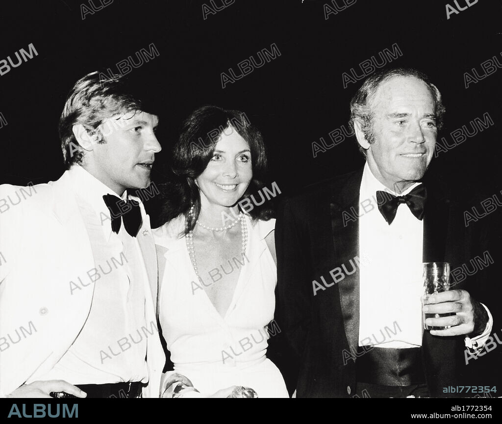 Helmut Berger and Henry Fonda, with his wife Shirley, have been prized at the 'David di Donatello' Awards. The Austrian actor Helmut Berger (on the left) and the US actor Henry Fonda (on the right), with his fifth wife Shirley (in the centre), are photographed together at the ancient theatre of Taormina for the 18th edition of the 'David di Donatello' Awards. The two actors have been prized with the 'David Speciale' Award. Taormina (Messina), July 21, 1973.