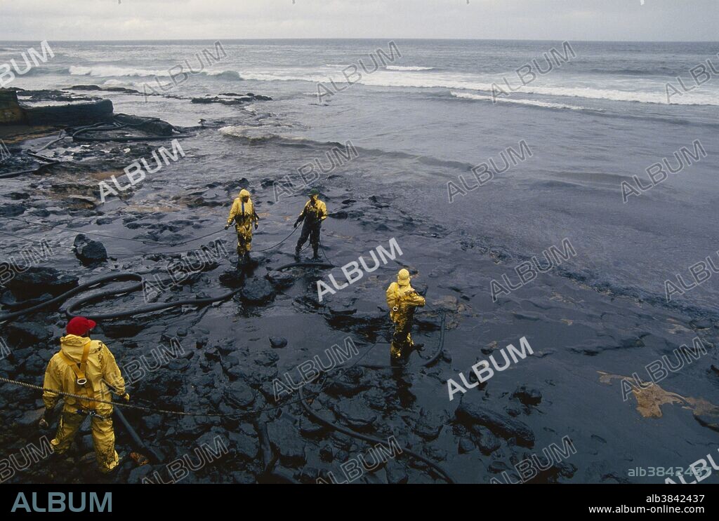 Cleanup crew at work after the Morris J. Berman oil spill, Punta Escambron, San Juan, Puerto Rico.
