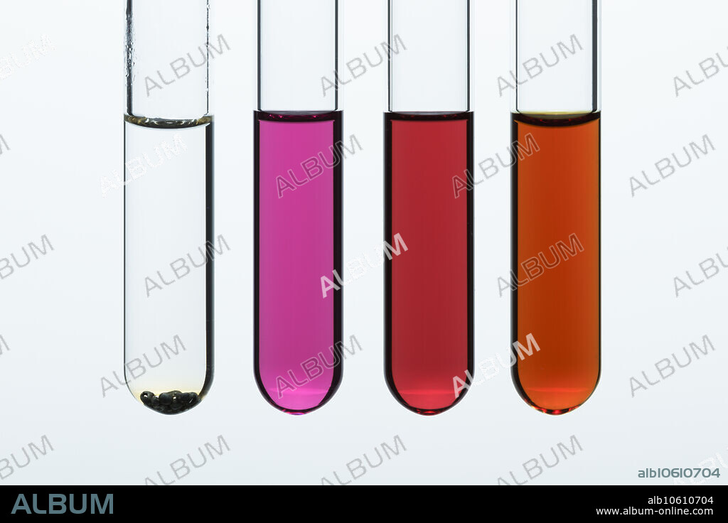Iodine solubility. Iodine (I2) molecule has a covalent non-polar bond. It is only sparingly soluble in polar solvents and is soluble in non-polar solvents. Here iodine solubility in different solvents is demonstrated, left to right: water (H2O), cyclohexane (C6H12), dichloromethane (CH2Cl2), and aqueous solution of potassium iodide (KI). In water, iodine stays at the bottom of the test tube and shows only a faint brown colour. Iodine dissolves in non-polar cyclohexane and dichloromethane showing violet and red colours, respectively. Iodine also dissolves in aqueous solution of potassium iodide due to formation of the triiodide ion (I3-), producing red-brown colour.