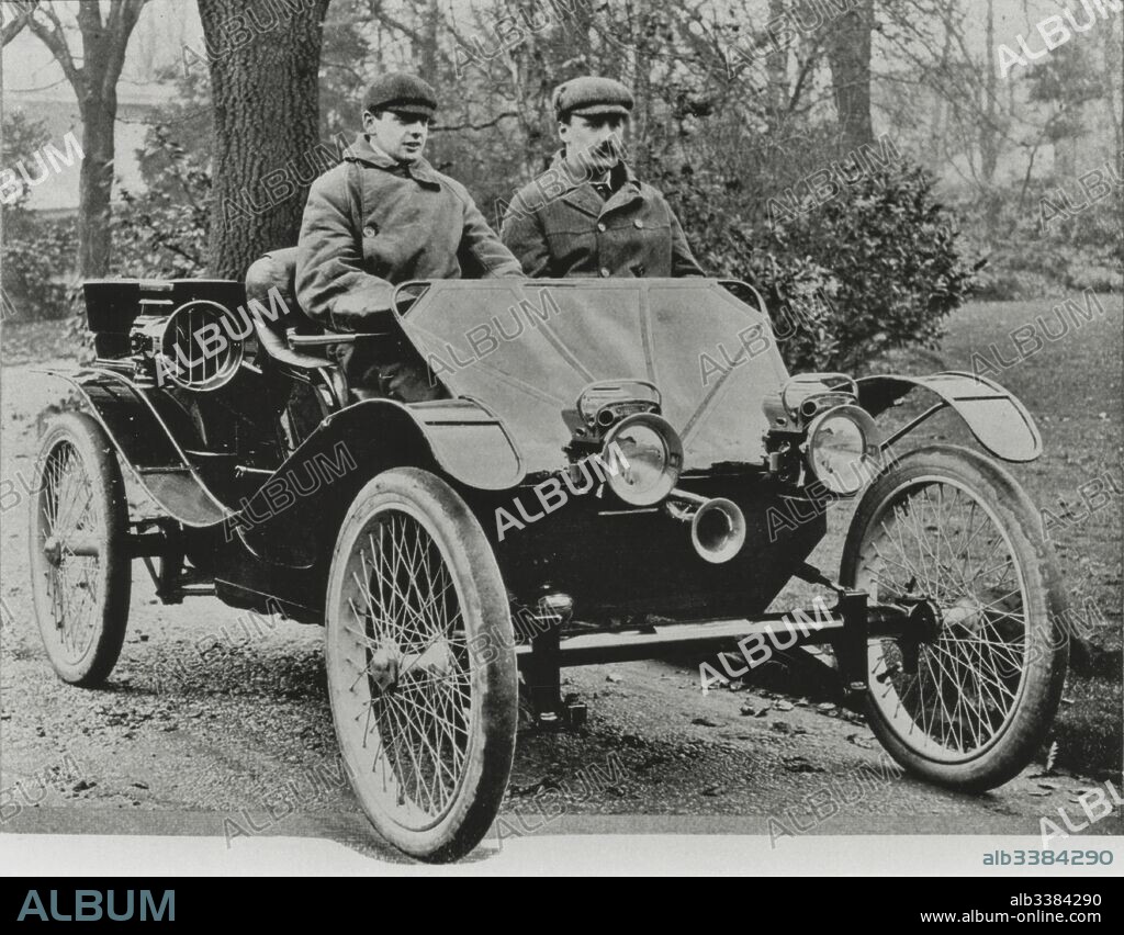 Frederick and George Lanchester seated in a motor vehicle.