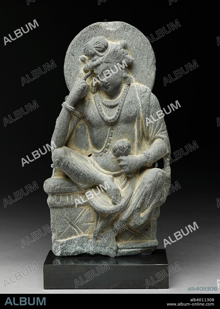 Figure of Avalokiteshvara in pensive pose, 3rd century. Dimensions: height x width x depth: with mount 28 x 12.7 x 4.5 cm max.height x width x depth: 25.5 x 13.7 x 4.5 cm max.