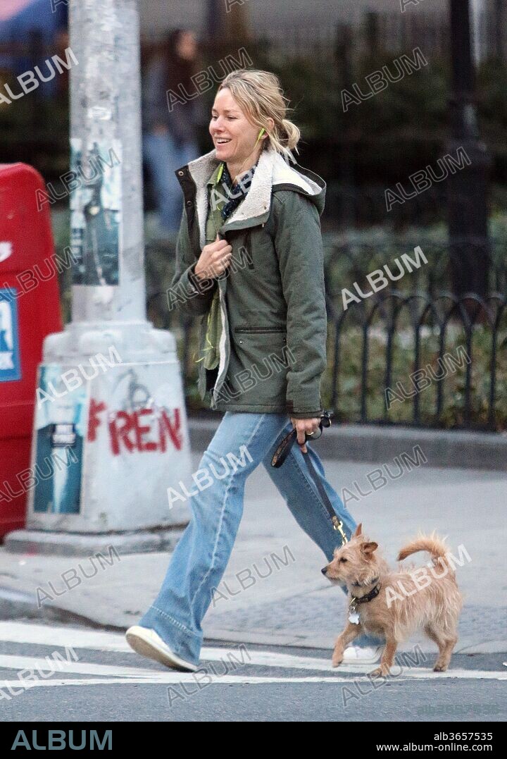 April 23, 2018 - New York, New York, United States - Actress Naomi Watts chats on her cellphone as she walks her dog in Tribeca on April23 2018 in New York City. 23/04/2018