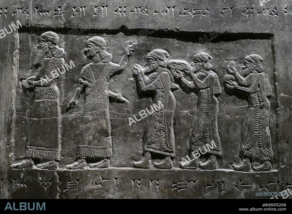 Detail from the Black Obelisk, of Shalmaneser III. A black limestone Assyrian sculpture with scenes in bas-relief and inscriptions. It comes from Nimrud (ancient Kalhu), in northern Iraq, and commemorates the deeds of King Shalmaneser III (reigned 858-824 BC).