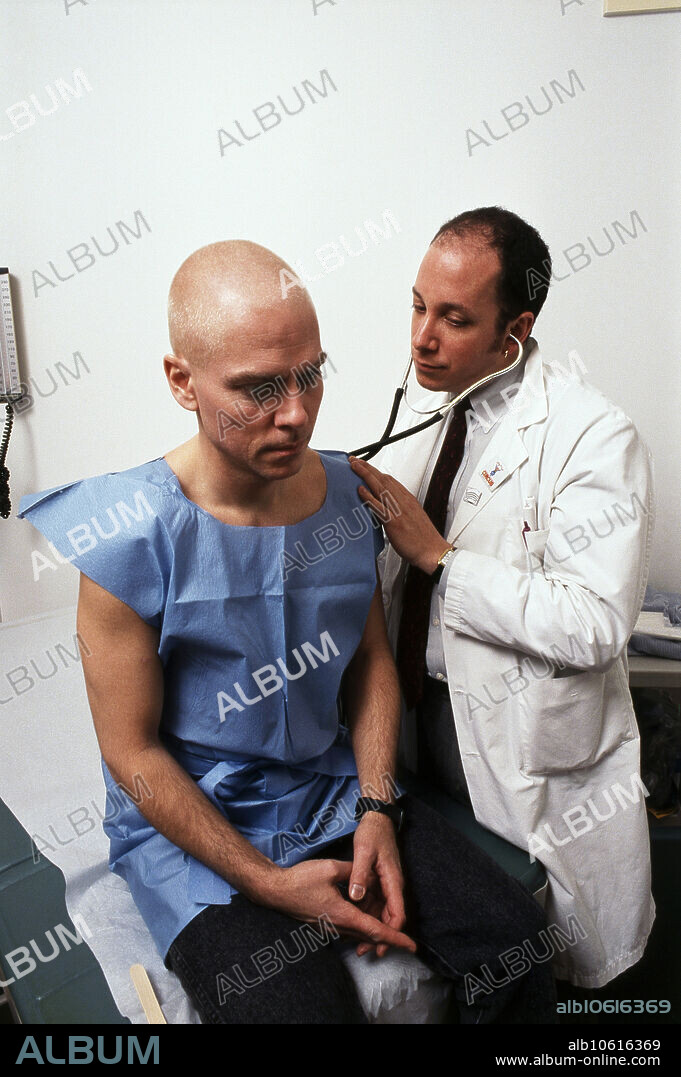 Editorial use only . Doctor Howard Grossman with HIV-positive patient John Nesnick, during an AZT study. AZT, or azidothymidine, was the first drug approved by the US government for the treatment of HIV. It was a breakthrough in AIDS therapy, significantly reducing the replication of the virus in patients and leading to clinical and immunologic improvements.