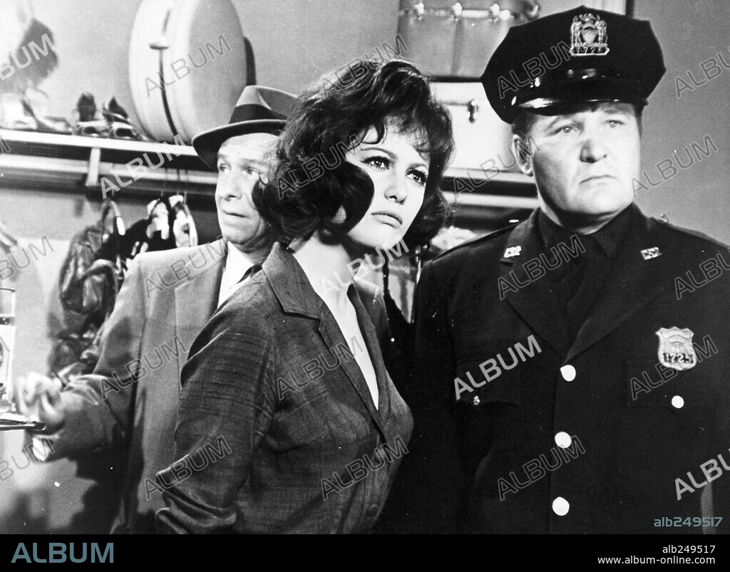 CLAUDIA CARDINALE and JACK WARDEN in BLINDFOLD, 1965, directed by PHILIP DUNNE. Copyright UNIVERSAL PICTURES.