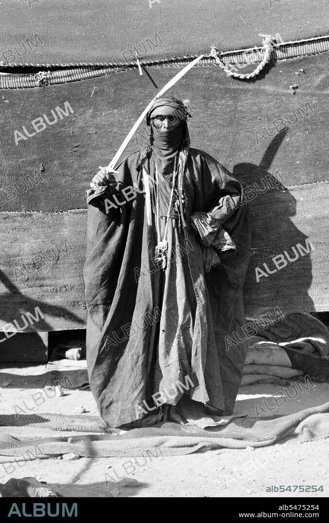 Bedouin are a part of a predominantly desert-dwelling Arabian ethnic group traditionally divided into tribes, or clans, known in Arabic as aasa'ir. The term 'Bedouin' derives from a plural form of the Arabic word badawi, as it is pronounced in colloquial dialects. The Arabic term badawi derives from the word badiyah, which means semiarid desert (as opposed to sahara', which means desert). Starting in the late nineteenth century, many Bedouin under British rule began to transit to a seminomadic life. In the 1950s and 1960s, large numbers of Bedouin throughout Midwest Asia started to leave the traditional, nomadic life to settle in the cities of Midwest Asia, especially as hot ranges have shrunk and populations have grown. For example, in Syria the Bedouin way of life effectively ended during a severe drought from 1958 to 1961, which forced many Bedouin to abandon herding for standard jobs. Similarly, governmental policies in Egypt and Israel, oil production in the Persian Gulf, as well as a desire for improved standards of living, effectively led most Bedouin to become settled citizens of various nations, rather than stateless nomadic herders.