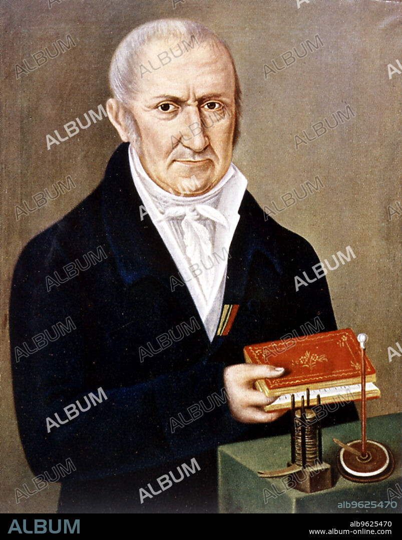 Alessandro Volta (1745-1827) Italian physicist. On the table are two of his inventions, the Voltaic pile (wet battery) on the left, and the electrophorus, an apparatus demonstrating electrostatic charge by induction. His name is given to the unit of electromotive force, the volt.