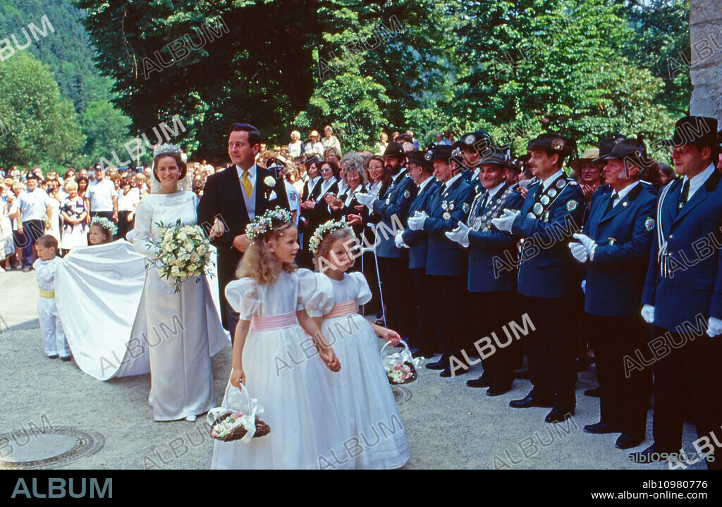 Alexander Prince of Sayn Wittgenstein Sayn leading his daughter Princess Alexandra zu Sayn Wittgenstein Sayn to the wedding with Prince Carl Eugen zu Oettingen and Wallerstein at Bendorf, Germany 1994.