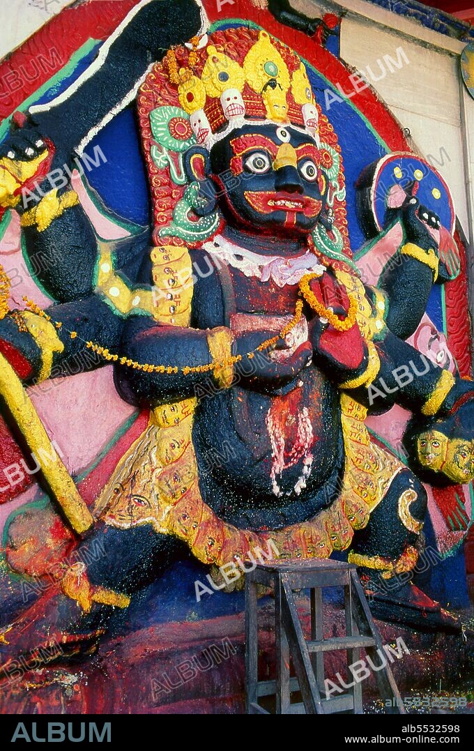 The Kala Bhairav or Black Bhairav is a 3m-high statue depicting a sword-wielding, terror-inducing manifestation of Shiva trampling on some unfortunate victim. Local lore has it that the image was found on the Nagarjun mountain on the western rim of the Kathmandu Valley and brought to its current place by King Pratapa Malla. Once the image was set up in Durbar Square, royal courtiers had to swear oaths of allegiance in front of it and witnesses in criminal cases had to testify in its presence. It was believed that anybody telling lies in front of Kala Bhairav would immediately die. Kala Bhairav also demanded blood sacrifices and until today numerous animals are slaughtered in front of the figure during the festival of Dassain. Bhairava sometimes known as Kala Bhairava, is a Hindu deity, a fierce manifestation of Shiva associated with annihilation. He originated in Hindu mythology and is sacred to Hindus, Buddhists and Jains alike. He is worshipped in Nepal, Rajasthan, Karnataka, Tamil Nadu and Uttarakhand.