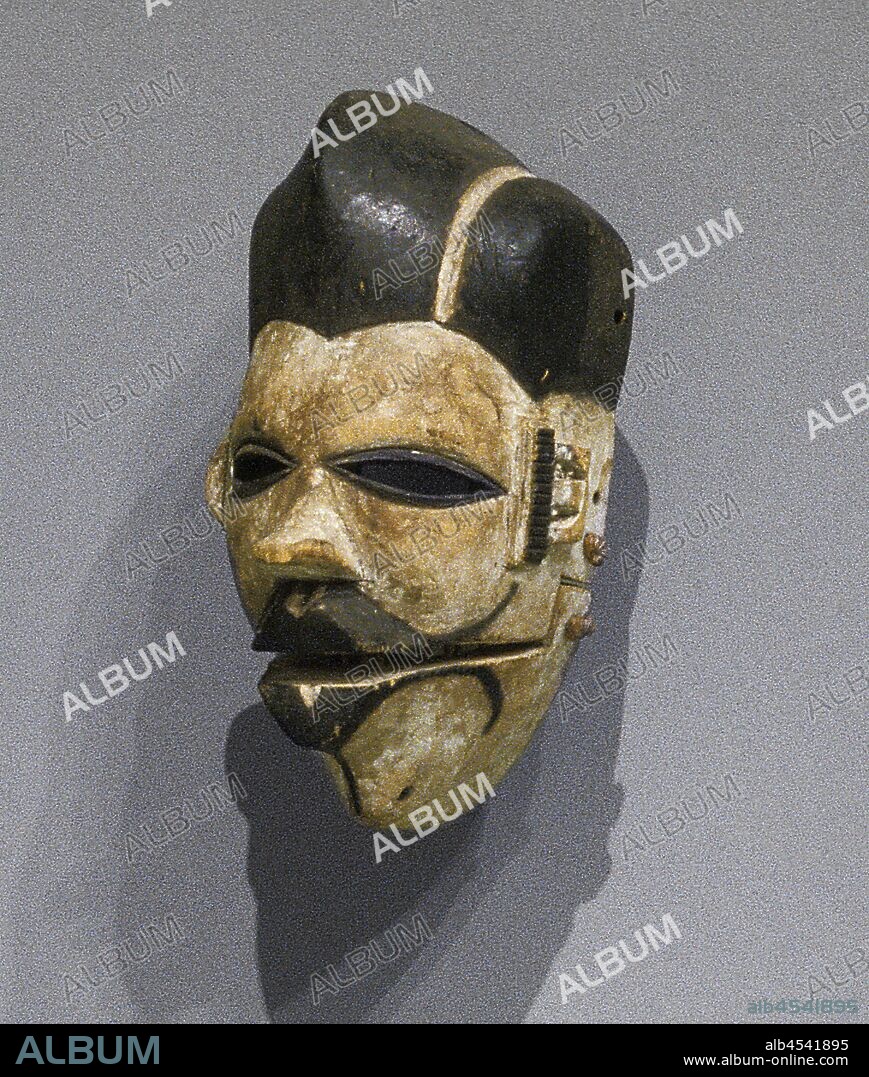 Elu face mask, Ogoni people, 20th century, wood, pigment, fiber, 8-3/4 x 5-1/2 x 5 in., African Art.