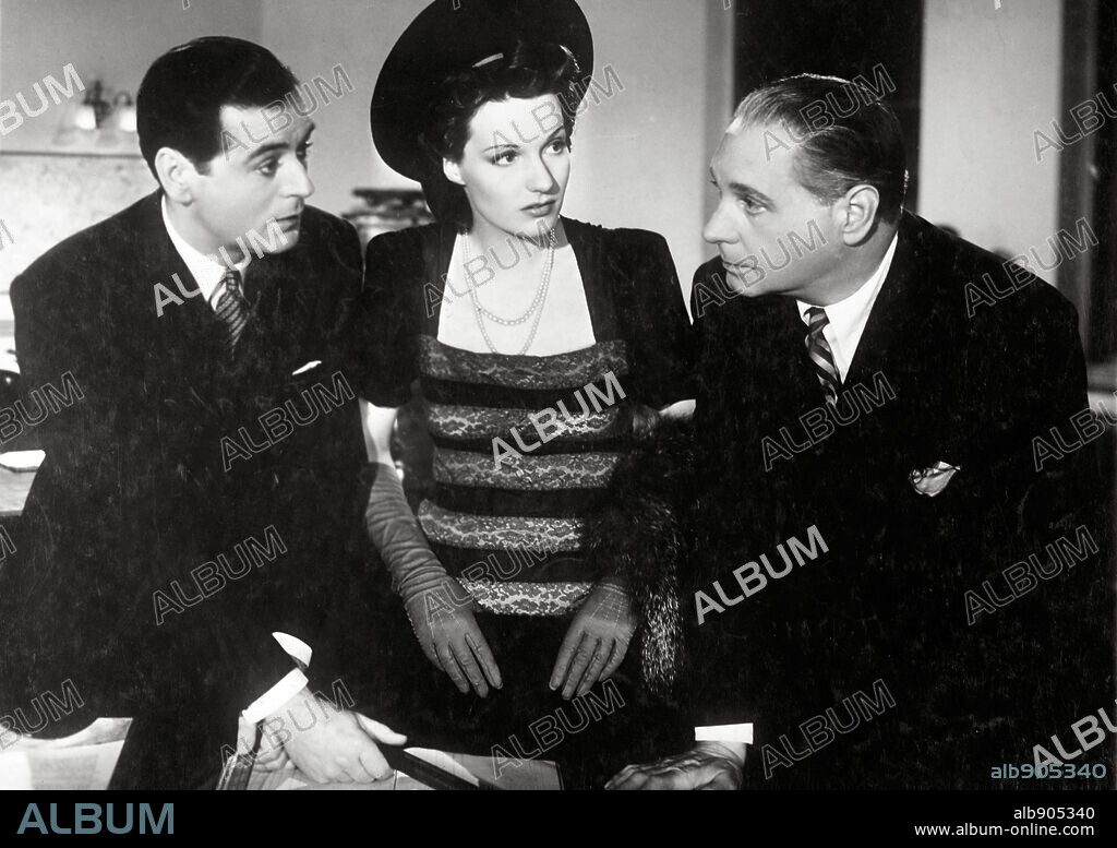 JUDY CAMPBELL and SEBASTIAN SHAW in THE STRANGLER, 1941 (EAST OF PICCADILLY), directed by HAROLD HUTH. Copyright ABPC.