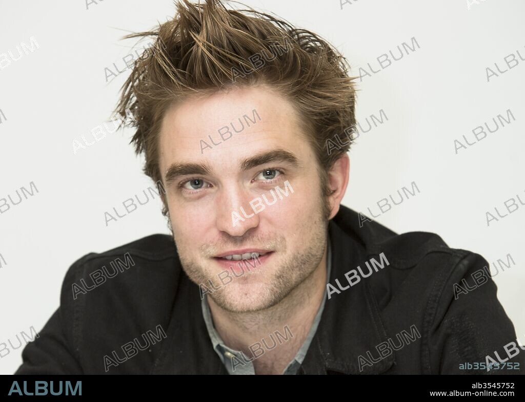 ROBERT PATTINSON. August 3, 2017 - Hollywood, California, U.S. - ROBERT PATTINSON stars in the movie 'Good Time.' Robert Douglas Thomas Pattinson (born May 13, 1986) is an English actor, producer, model, and musician. Pattinson started his film career by playing Cedric Diggory in Harry Potter and the Goblet of Fire. He later got the leading role of vampire Edward Cullen in the film adaptations of the Twilight novels by Stephenie Meyer, which consisted of five films between 2008 and 2012 that combined grossed over .3 billion in worldwide receipts. Twilight brought Pattinson worldwide fame, and established him among the highest paid and most bankable actors in Hollywood. (Credit Image: © Armando Gallo via ZUMA Studio). 03/08/2017