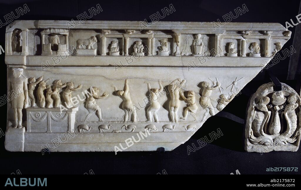 Marble antefix by Luni with snakes from the Temple of Isis at Campo Marzio, Rome, and white marble relief depicting an Egyptian temple, artefact uncovered in Ariccia, Rome, Italy. Roman Civilisation, 1st-2nd century.