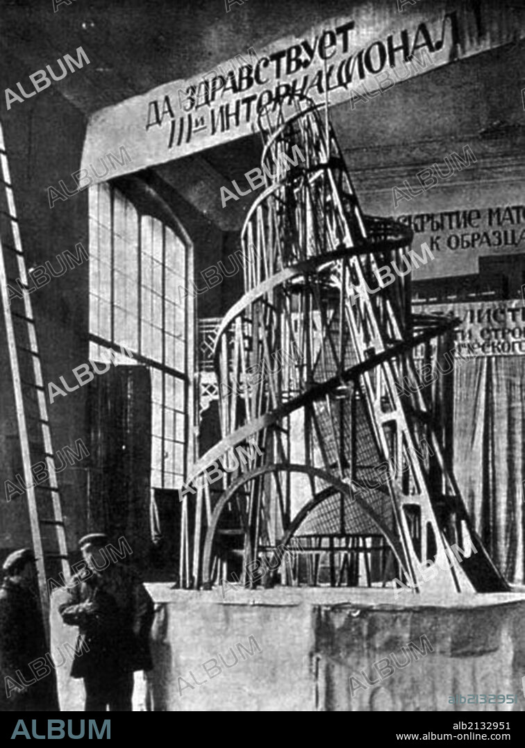 The monument to the third international (tatlin's tower) by vladimir tatlin, the model of the proposed tower in the studio of materials, volume, and construction (the former academy of arts) in petrograd, 1920.